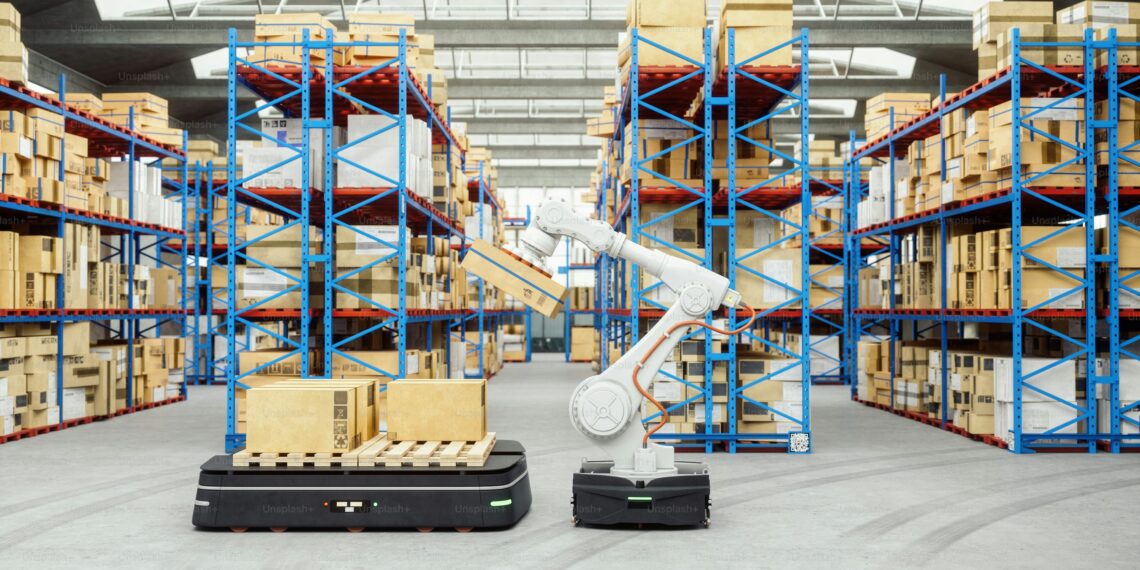 Modern automated warehouse with AGV robots navigating between high-density shelving units